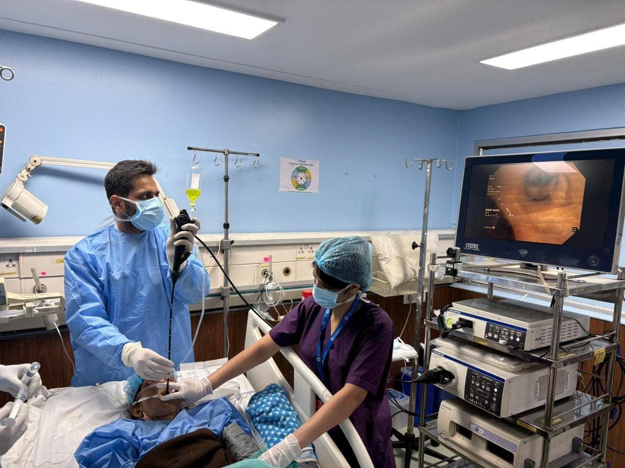 Dr. Kunal Luthra performing a flexible bronchoscopy, airway view on the monitor