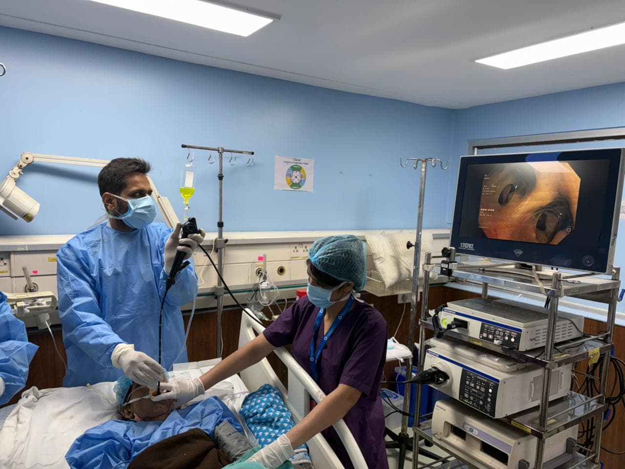 Dr. Kunal Luthra performing a bronchoscopy procedure with his clinical team